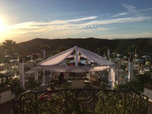 hummingbird nest ranch tent with draping and lighting chiavari chairs white dance floor