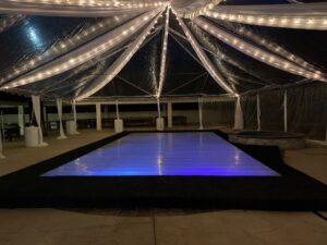 clear top tent with draping and lights
